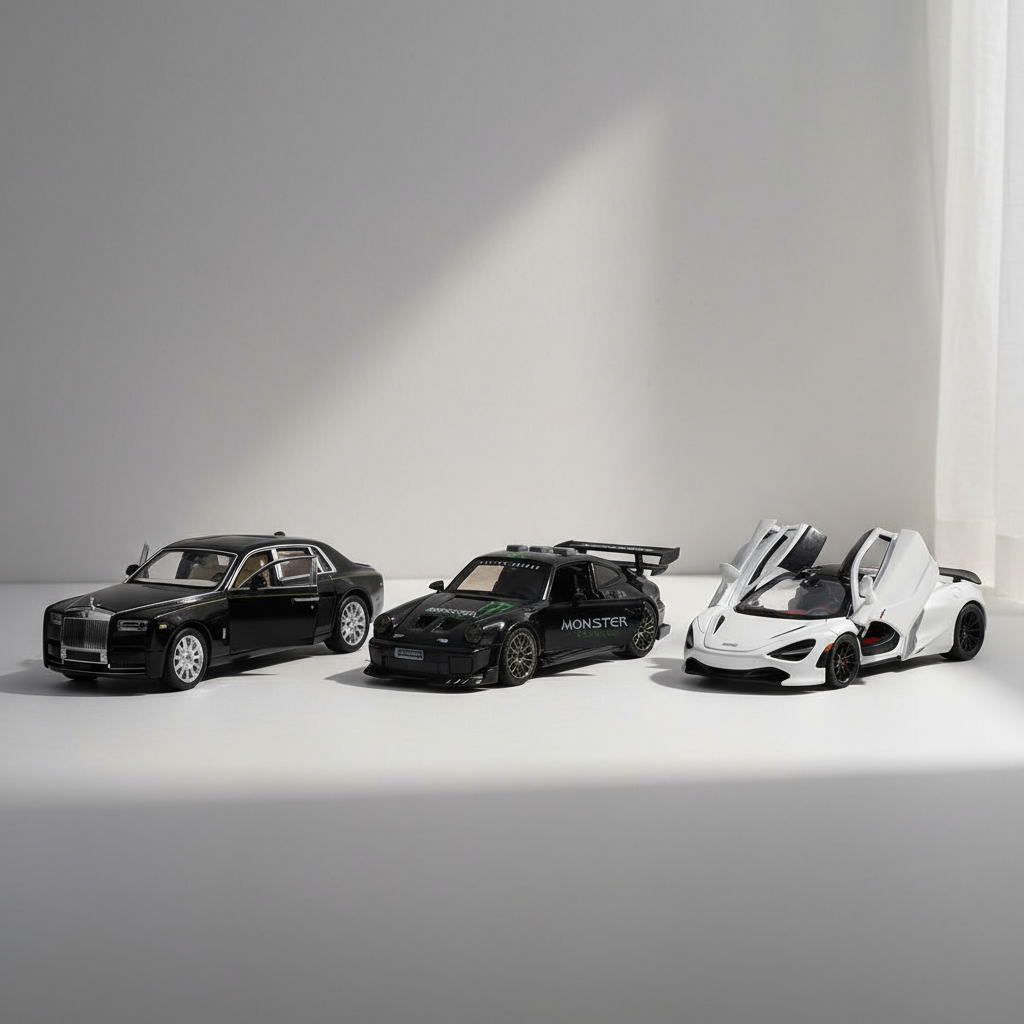 Three luxury cars on a gray background