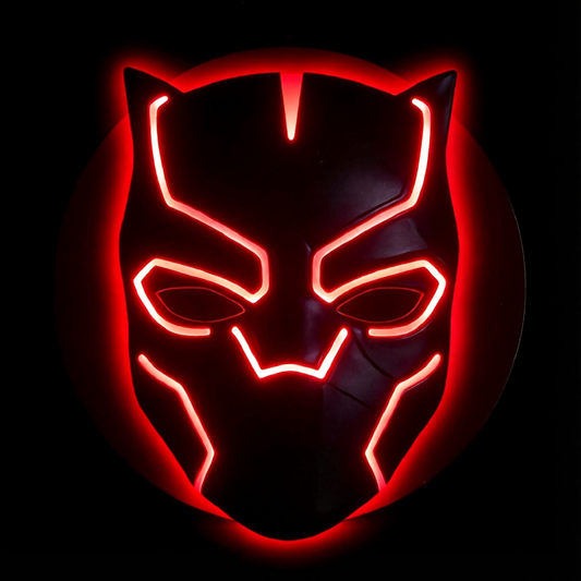 Black Panther-inspired LED wall lamp featuring a black superhero mask with glowing purple and pink backlighting on a brick wall
