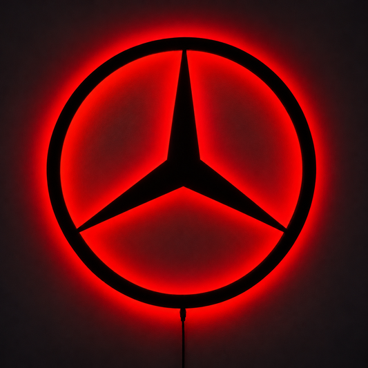Mercedes-Benz three-pointed star logo LED wall sign with warm yellow backlighting on a white wall
