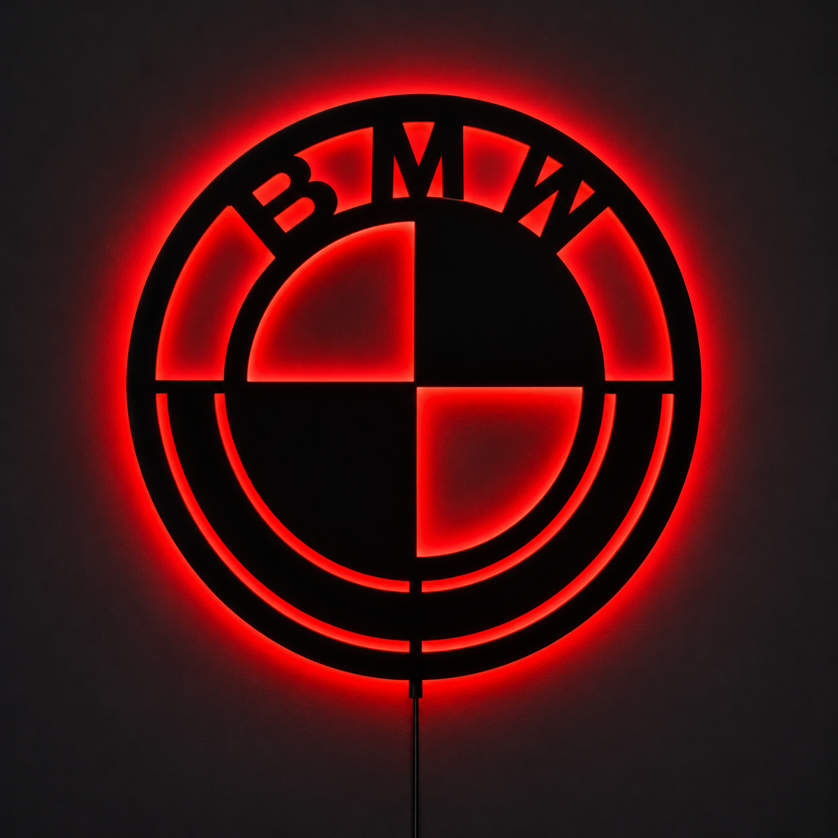 BMW-inspired LED logo wall sign with blue illumination and white backlighting in a modern living room