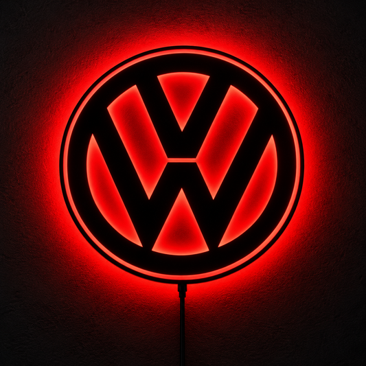 Volkswagen VW logo LED wall sign with warm yellow backlighting on a dark wall, automotive decor for garages and car enthusiasts.