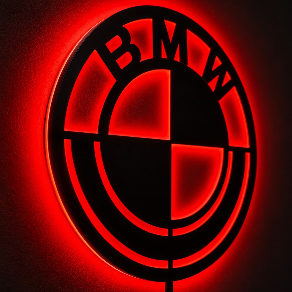 BMW-inspired LED logo wall sign with blue illumination and white backlighting in a modern living room