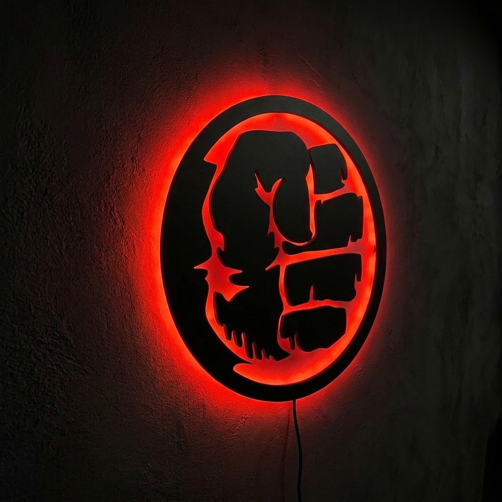 Black circular Hulk-inspired LED wall lamp with vibrant green backlighting for superhero and gaming room decor
