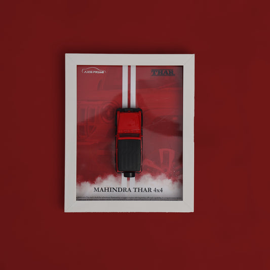 Red and black car light switch in a white frame on a red background