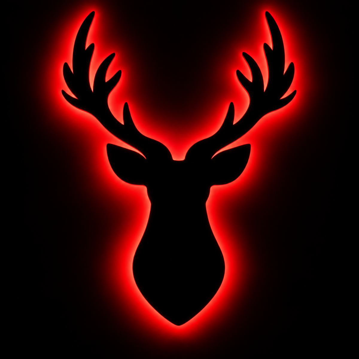 Deer head LED wall lamp with black antler silhouette and warm yellow glowing light against a blue background
