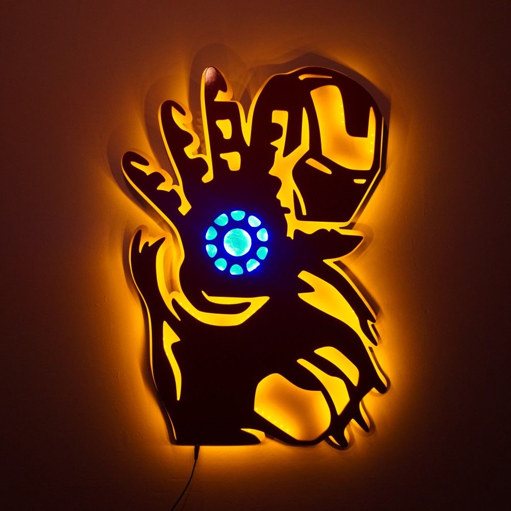 Iron Man LED wall lamp with golden-yellow backlighting and blue Arc Reactor design for superhero and gaming room decor
