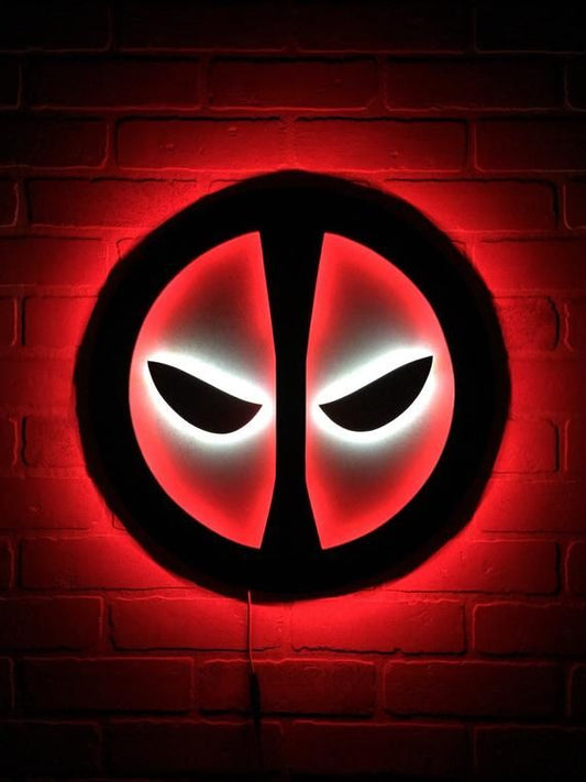 Deadpool LED wall lamp with glowing white eyes and red backlighting for superhero and gaming room decor
