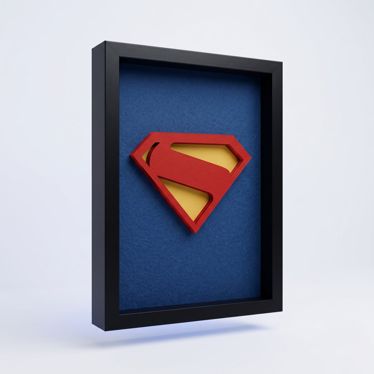 Premium Superman 3D frame with red and yellow emblem on blue background and black shadow box frame