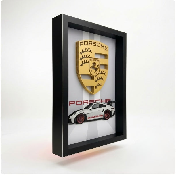 Premium Porsche car 3D wall frame with Porsche emblem and sports car design in a black shadow box frame