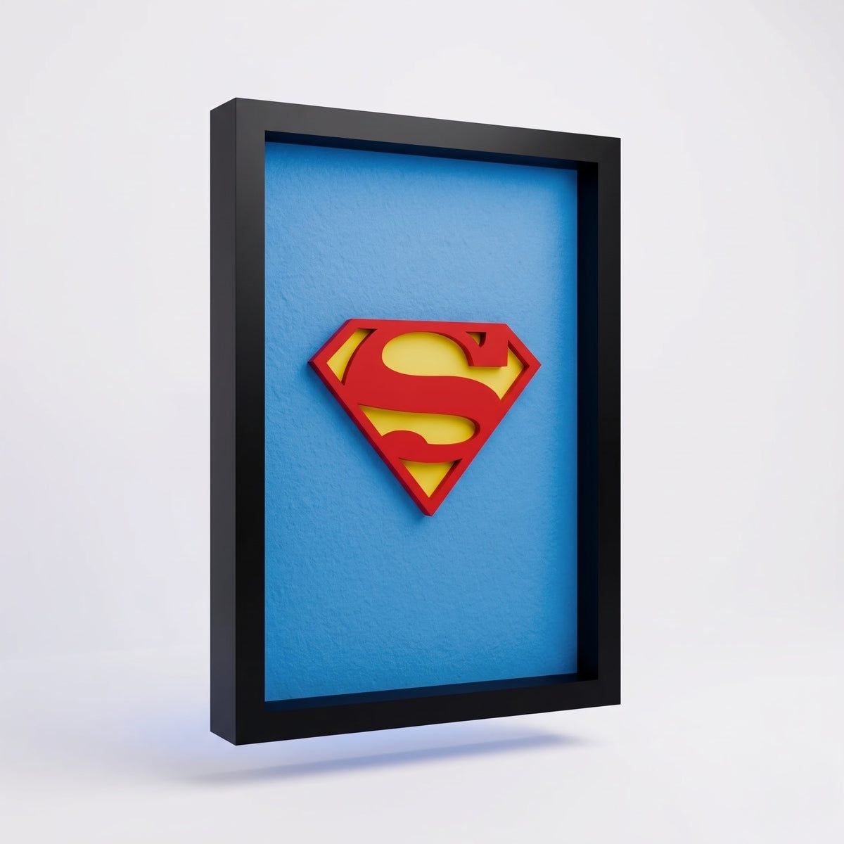Premium Superman 3D shadow box frame with red and yellow emblem on blue background and black frame