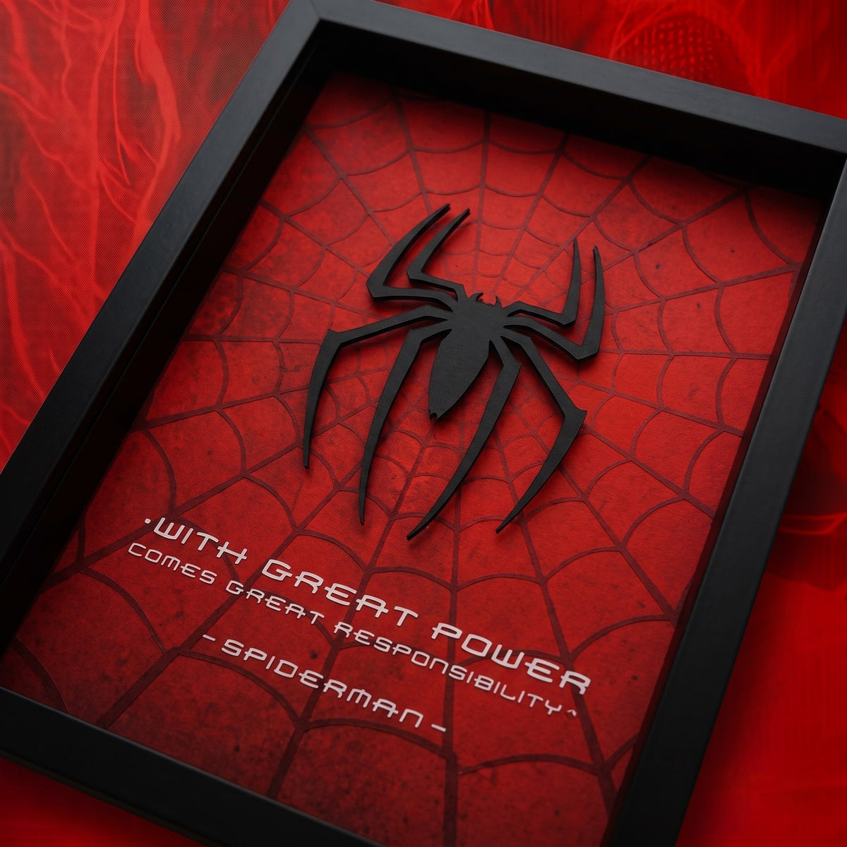 Spider-Man 3D wall frame with black raised spider emblem on red web background