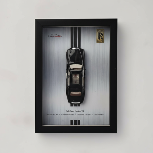 Framed model of a Rolls-Royce car on a gray background