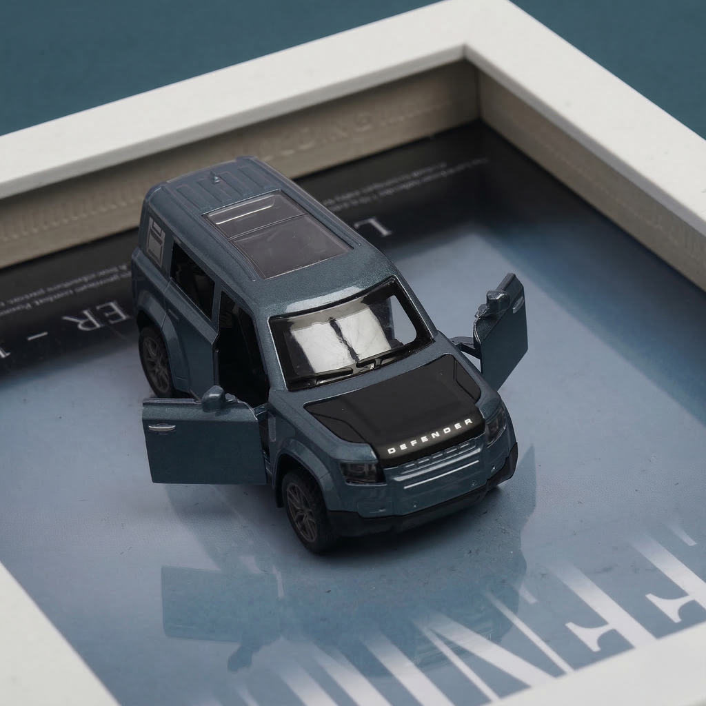 Land Rover Defender 110 car frame featuring Defender diecast car