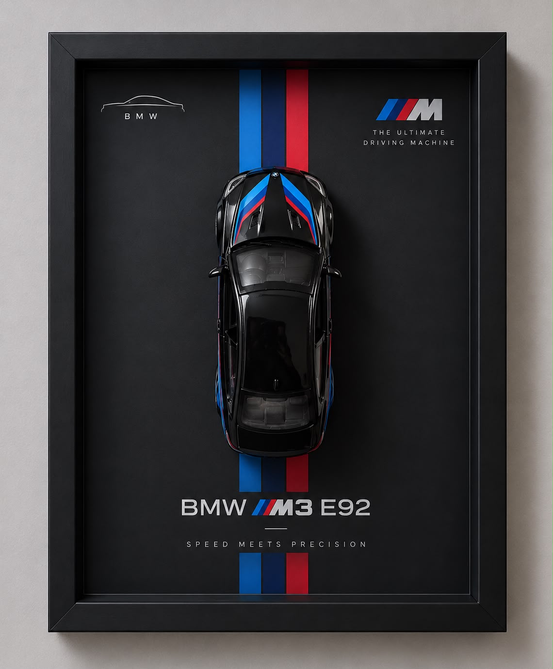 Black BMW M3 E92 diecast car displayed in a premium black 3D Car Frame with blue and red motorsport racing stripes and luxury automotive wall art.