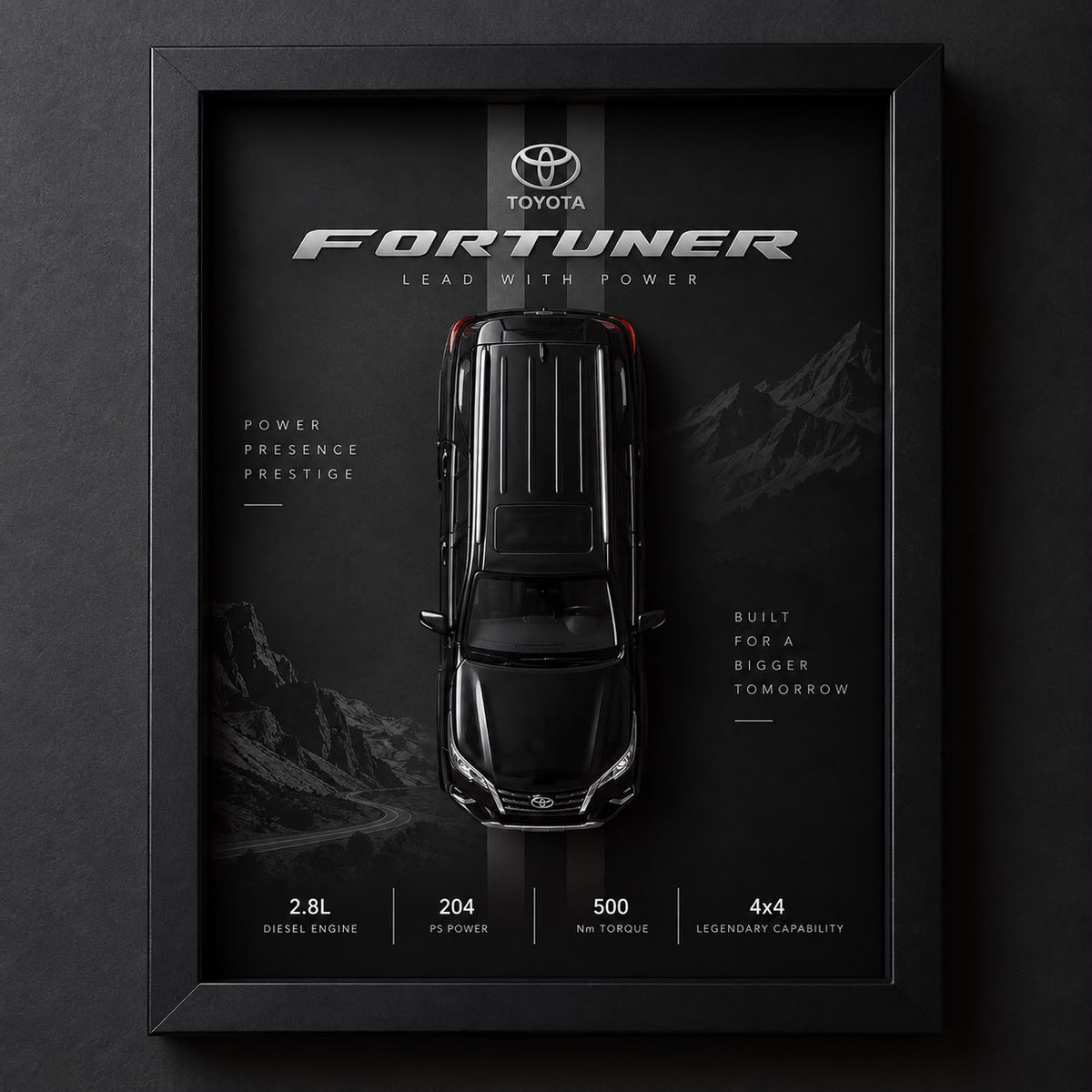 Premium Toyota Fortuner 3D Car Frame featuring a black miniature SUV, black shadow box frame, and mountain-inspired automotive background